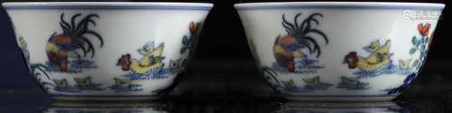 A pair of Chinese doucai 'Rooster' cups, Yongzheng mark, H 4...