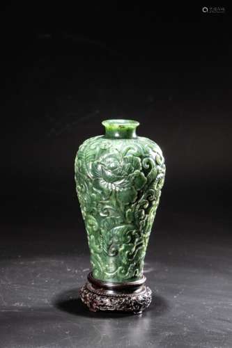 A Chinese green-jade 'Flower' meiping vase, finely sculpted ...