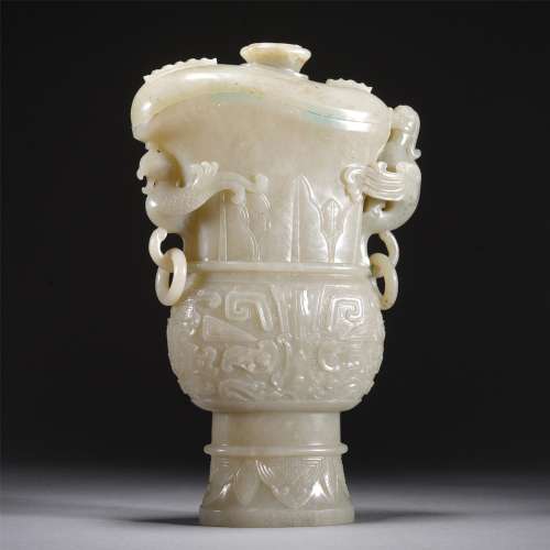 A WHITE JADE CARVED BEAST FACE JUE CUP,QING