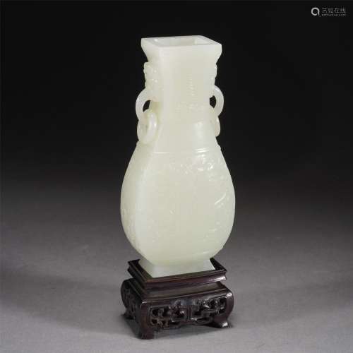 A CARVED JADE VASE WITH STAND