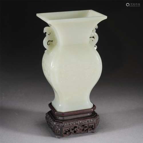 A CARVED JADE VASE GU WITH DOUBLE HANDLES