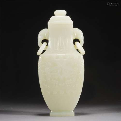 A CARVED DJADE VASE WITH COVER