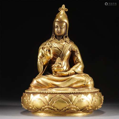 A TIBETAN GILT BRONZE PADMASAMBHAVA