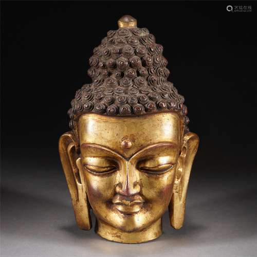 A GILT BRONZE BUDDHA HEAD