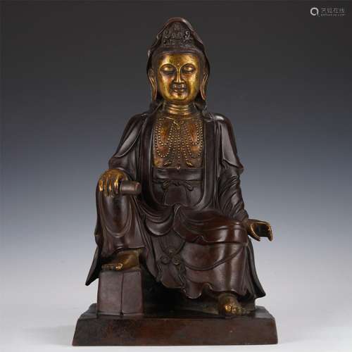 A PARTLY GILT BRONZE SEATED GUANYIN