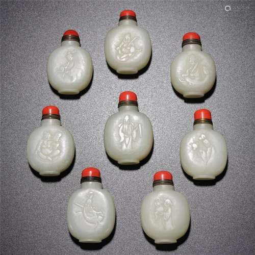 A GROUP OF WHITE JADE CARVED SNUFF BOTTLES,QING