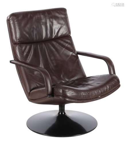 Brown leather swivel armchair