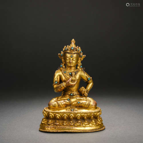 A Gilt Bronze Statue of Buddha Inlaid with Pine Stones, Qing...