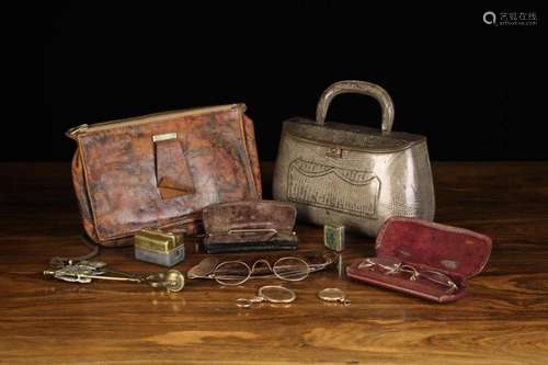 A Marbled Leather Pouch and A Novelty Tin Hangbag of simulat...