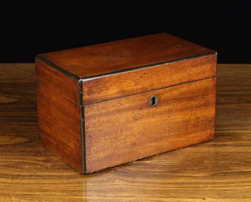 A Victorian Mahogany Tea Caddy of rectangular form with ebon...