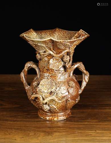 A Large Victorian Salt-Glazed Stoneware Vase. The bulbous bo...