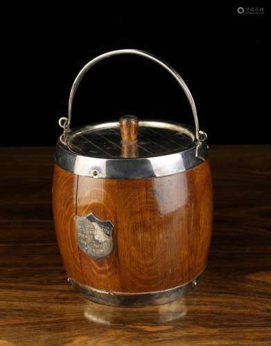 A Late 19th Century Oak Ice Pail with silver plated mounts a...