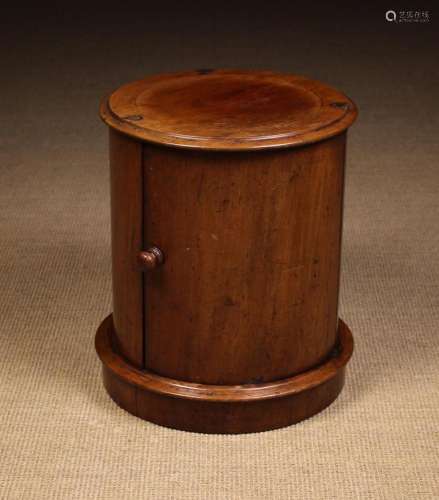 A Small Victorian Mahogany Cylindrical Pedestal Cupboard. Th...