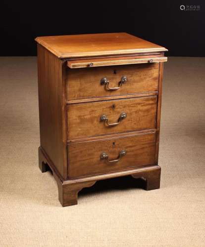 A Late Georgian Mahogany Pedestal Chest. The edge moulded to...