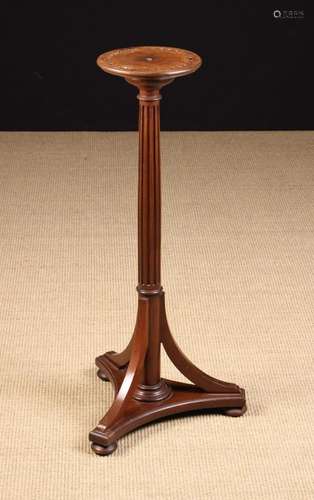 A Small Mahogany Tripod Stand. The round top bordered with a...