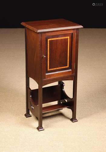 An Edwardian Mahogany Side Cabinet. The top with moulded edg...