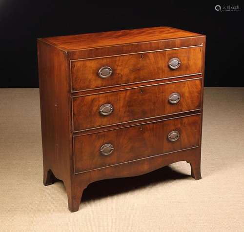 A 19th Century Mahogany Chest of Drawers. The rectangular to...