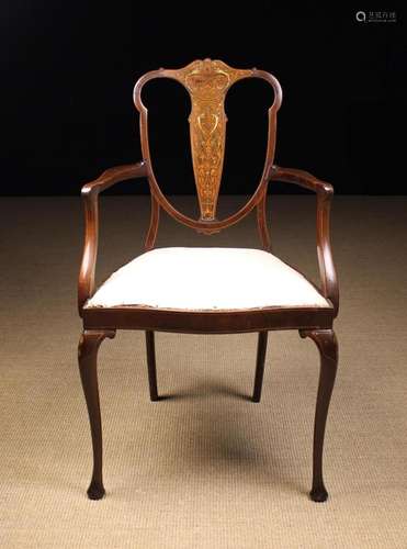 An Edwardian Inlaid Mahogany Armchair of modest proportions....