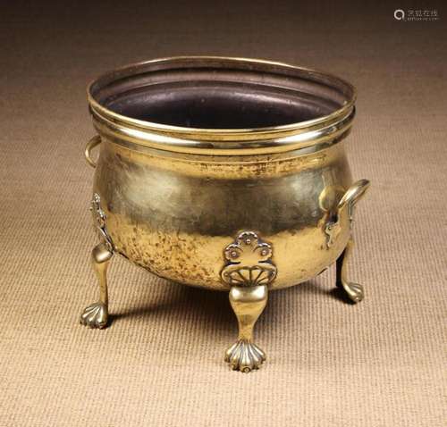 A Handsome 19th Century Brass Log Bin of oval bulbous form. ...