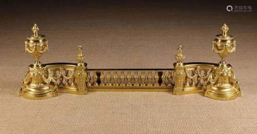 A Pair of Decorative Brass Louis XVI Style Chenets bridged b...