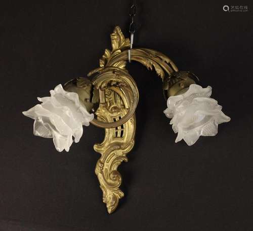 A Bronze Louis XV Style Twin Branch Wall Sconce. The rococo ...