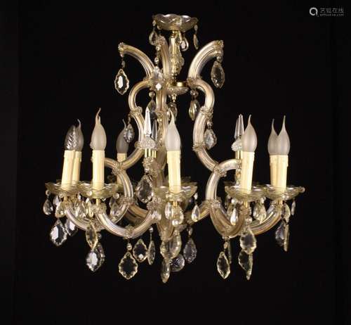 A Decorative Glass Chandelier with ten scrolling branched on...