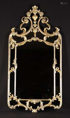 An Elaborate Italian Carved Silvered Giltwood Wall Mirror. T...