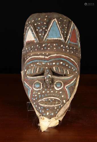 An African Carved & Painted Face Mask, 20th Century, wit...