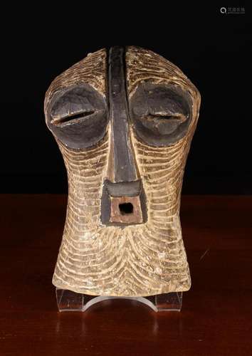 An African Carved & White Painted Wooden Kifwebe Mask of...