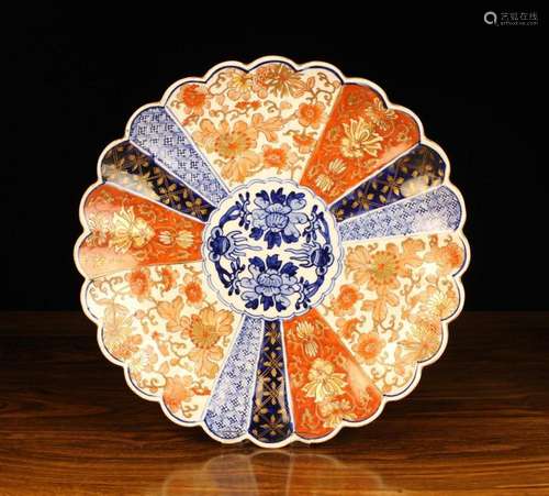 A Late 19th Century Radial Fluted Imari Plate with scalloped...