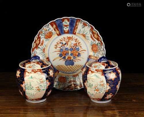 A Pair of 20th Century Lidded Imari Jars with loop handles, ...