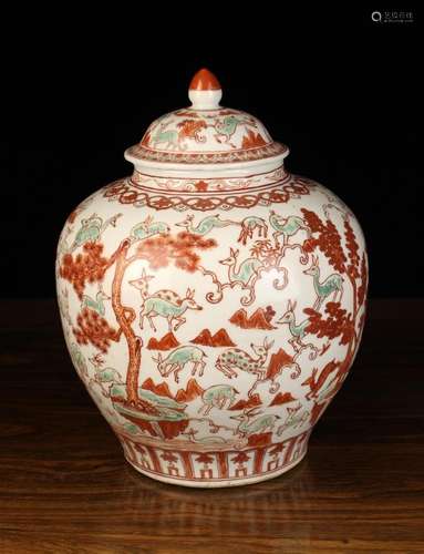 A Chinese Lidded Jar decorated with jade enamelled deer outl...