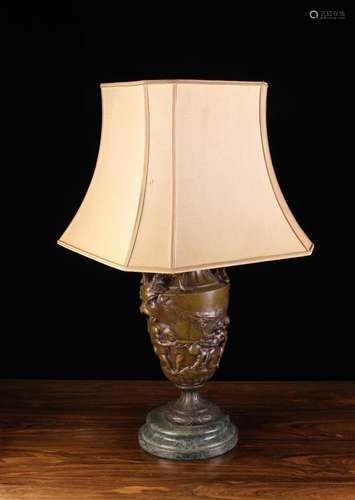 A Bronze Patinated Spelter Table Lamp. The urn shaped body c...