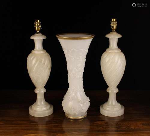 A Pair of White Onyx Table Lamps with ovoid wrythen fluted b...