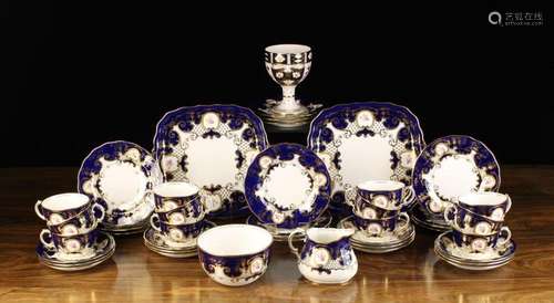 A Royal Crown Derby Tea-set Circa 1915 decorated with pink r...