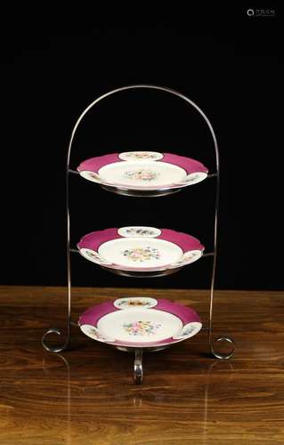 A Vintage Three Tier Cake Stand by Mappin & Webb. The th...