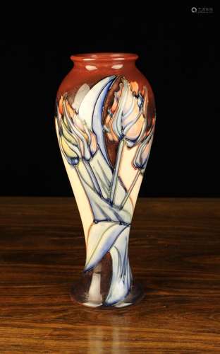 A Moorcroft Vase of rising baluster form decorated with tuli...