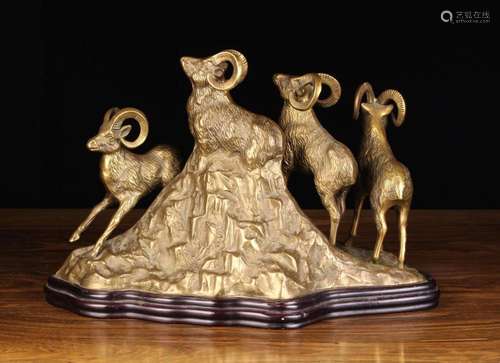 A Golden Patinated Spelter Group of four Ibexes on a rocky o...