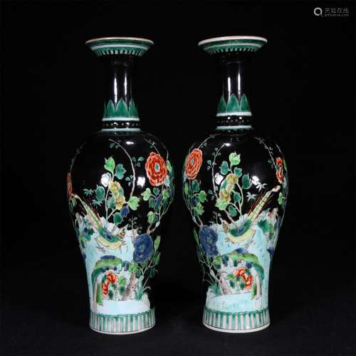 A pair of black multicolored golden pheasant and peony vase