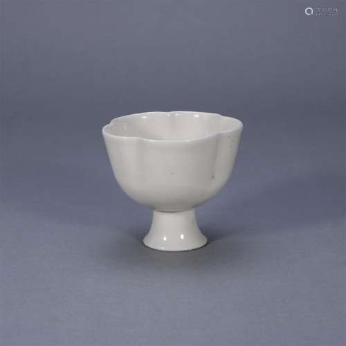 White glazed flowered cup