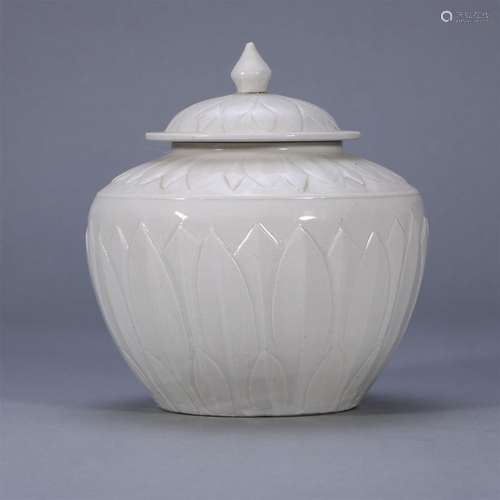 White glazed carved lid jar