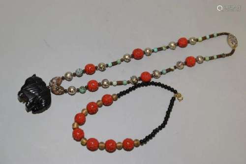 Two Chinese Cinnabar Carved Bead Necklaces