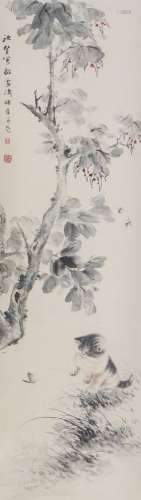 A CHINESE PAINTING OF A CAT UNDER FLOWERS TREE