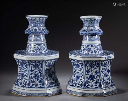 A PAIR OF CHINESE BLUE AND WHITE PORCELAIN CANDLE HOLDERS