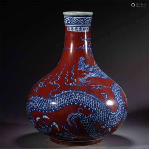 A CHINESE BLUE AND WHITE UNDERGLAZED RED PORCELAIN DRAGON VA...