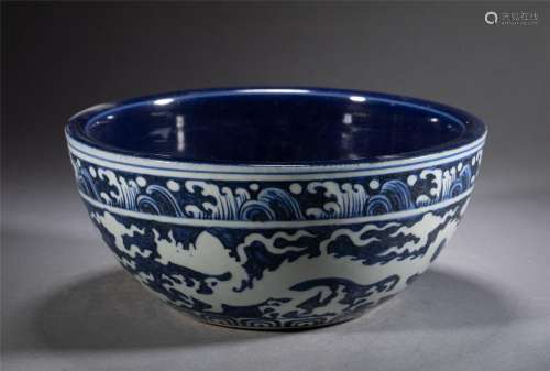 A CHINESE BLUE AND WHITE PORCELAIN WHITE DRAGON BOWL