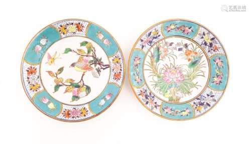 Two Oriental dishes, one decorated with a bird perched on a ...