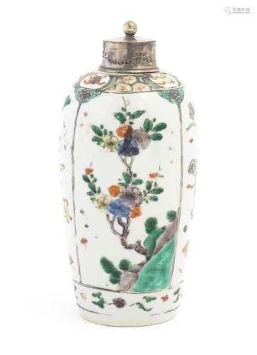 A Chinese famille verte jar of ovoid form with white metal m...