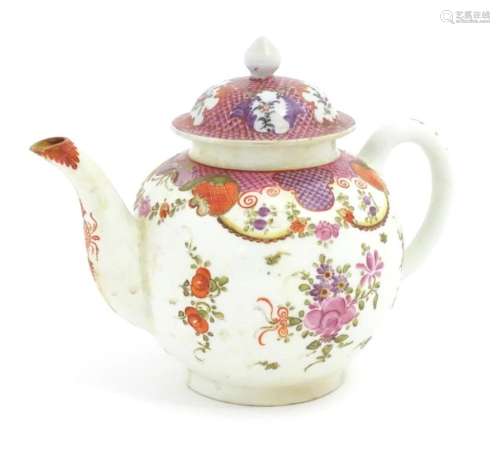 A Lowestoft teapot decorated in the Curtis pattern decorated...