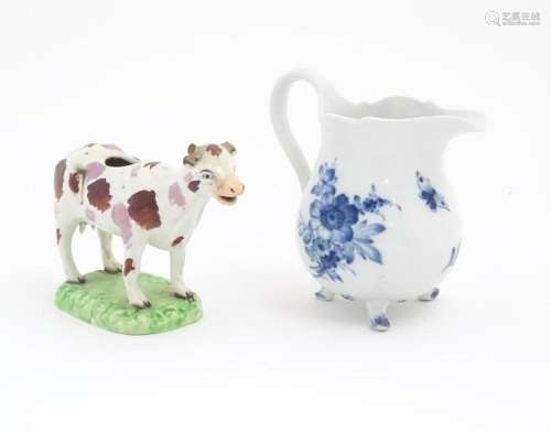 A Swansea cow creamer. Together with a Continental blue and ...